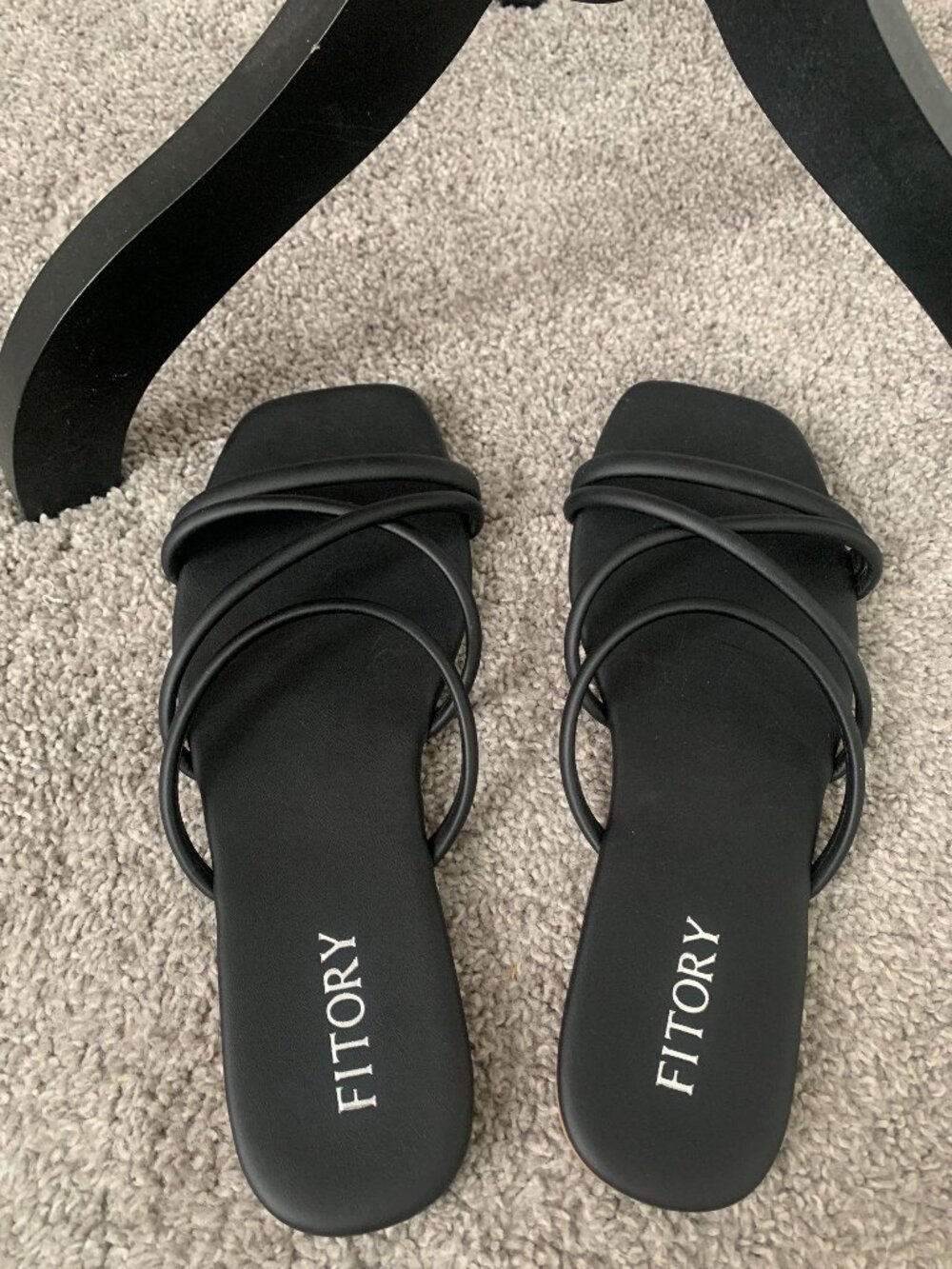 Black Slide in Sandals by Fittory in a size 9